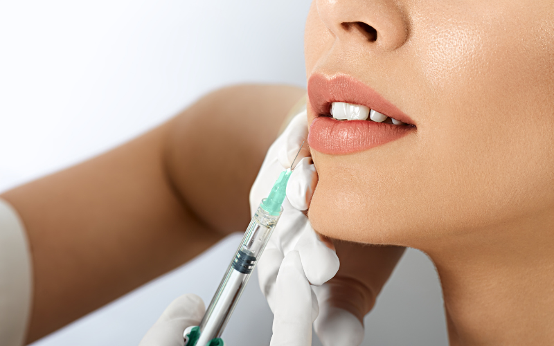 PMU machine and lip tinting tools prepared for procedure setup